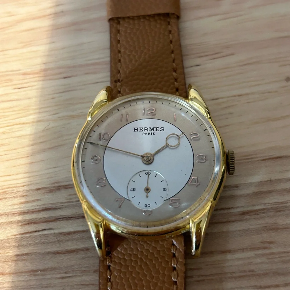 HERMES Paris “Moon Lugs” manual wind 33-34mm X 39mm, 17mm strap width.